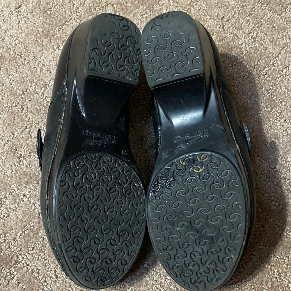 Dansko Black Leather Slip-On Size 36 (6) Loafers with Buckle Accent Clogs